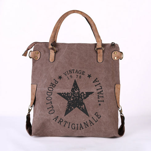 Women Canvas Tote Bag With Pu Leather strap.